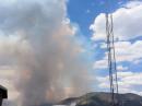 Smoke from the Museum Fire is in the distance as CARC members complete a temporary radio setup for more effective communication.